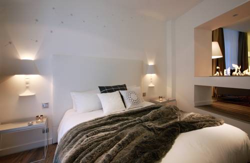 Imagen de la habitación del Hotel Petit Confidentiel. Foto 8