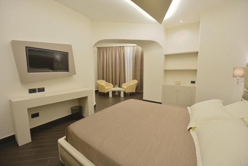 Imagen de la habitación del Hotel Petit Elita. Foto 8