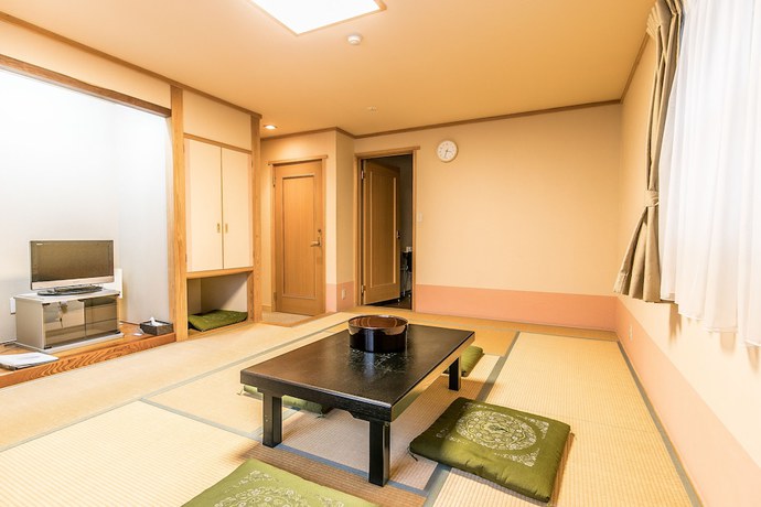 Imagen de la habitación del Hotel Petit Enchante. Foto 4