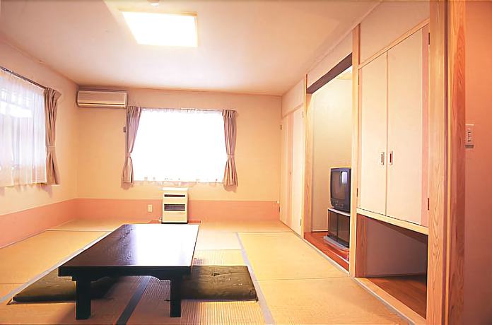 Imagen de la habitación del Hotel Petit Enchante. Foto 5