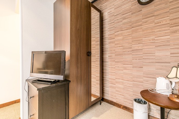 Imagen de la habitación del Hotel Petit Enchante. Foto 7