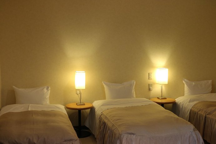 Imagen de la habitación del Hotel Petit Enchante. Foto 11
