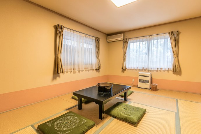 Imagen de la habitación del Hotel Petit Enchante. Foto 14