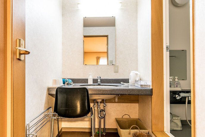 Imagen de la habitación del Hotel Petit Enchante. Foto 19