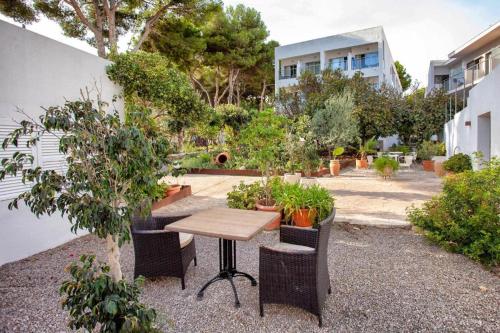 Imagen del bar/restaurante del Hotel Petit Garden by Flacalco. Foto 3