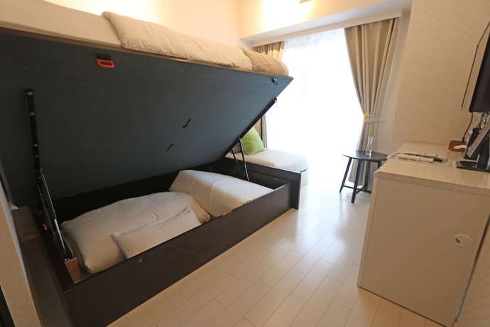Imagen de la habitación del Hotel Petit Grande Homes. Foto 14