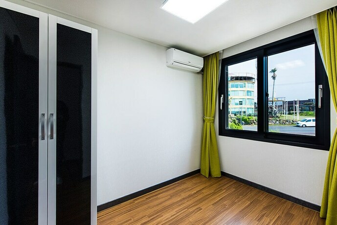 Imagen de la habitación del Hotel Petit Jeju Victor. Foto 14