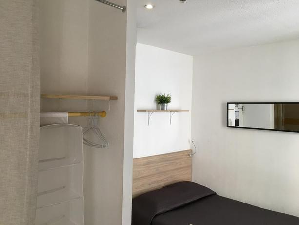 Imagen de la habitación del Hotel Petit Louvre. Foto 2