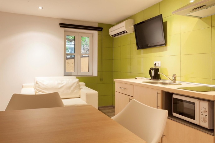 Imagen de la habitación del Hotel Petit Palace Boquería Garden. Foto 12