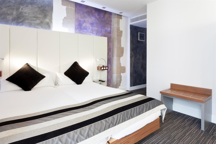 Imagen de la habitación del Hotel Petit Palace Boquería Garden. Foto 16