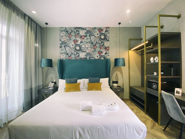 Imagen de la habitación del Hotel Petit Palace La Campana. Foto 3