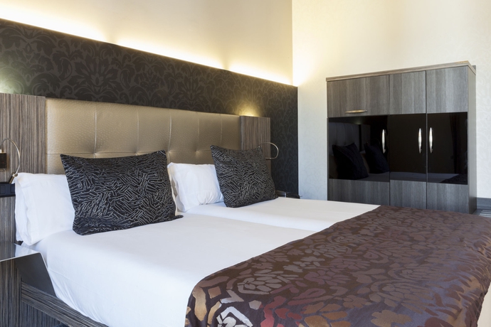 Imagen de la habitación del Hotel Petit Palace Museum. Foto 8