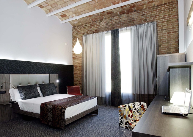 Imagen de la habitación del Hotel Petit Palace Museum. Foto 9