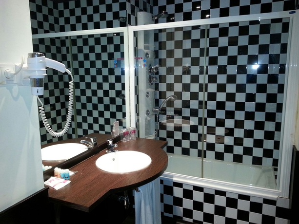 Imagen de la habitación del Hotel Petit Palace Plaza De La Reina. Foto 7