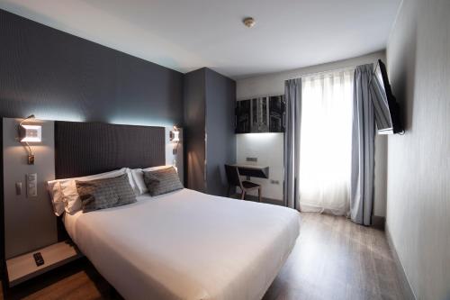 Imagen de la habitación del Hotel Petit Palace Plaza Espa&ntilde;a. Foto 5