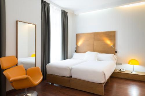 Imagen de la habitación del Hotel Petit Palace Plaza M&aacute;laga. Foto 15