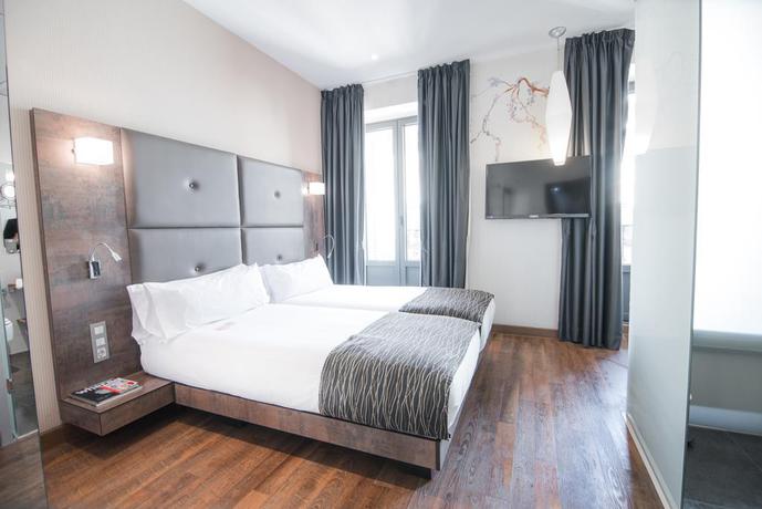 Imagen de la habitación del Hotel Petit Palace Posada Del Peine. Foto 9