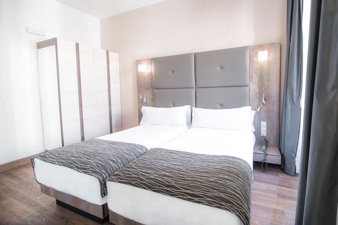 Imagen de la habitación del Hotel Petit Palace Posada Del Peine. Foto 11