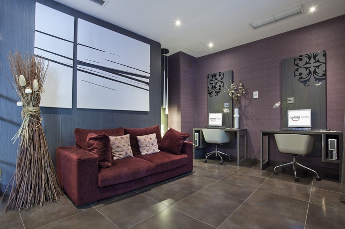 Imagen de los interiores del Hotel Petit Palace Puerta de Triana. Foto 12