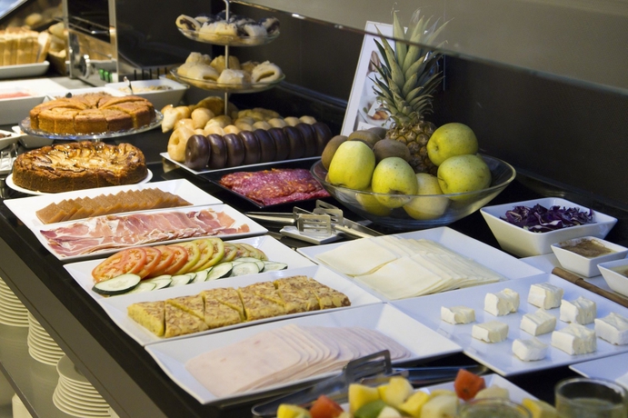 Imagen del bar/restaurante del Hotel Petit Palace Puerta de Triana. Foto 4