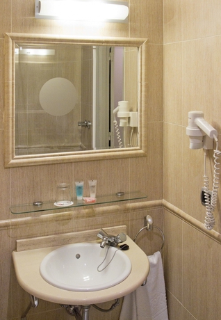 Imagen de la habitación del Hotel Petit Palace Puerta de Triana. Foto 7