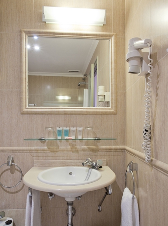 Imagen de la habitación del Hotel Petit Palace Puerta de Triana. Foto 10