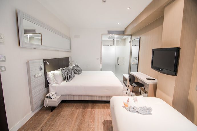 Imagen de la habitación del Hotel Petit Palace Puerta del Sol. Foto 2