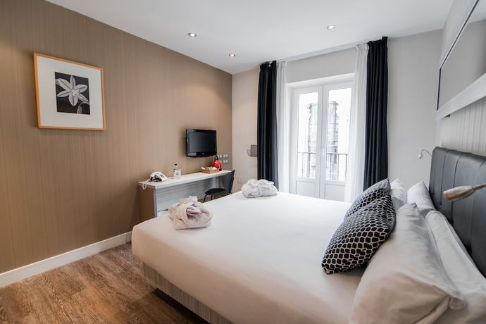 Imagen de la habitación del Hotel Petit Palace Puerta del Sol. Foto 11