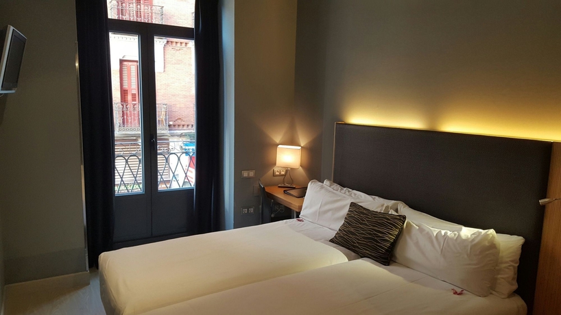 Imagen de la habitación del Hotel Petit Palace Tres Cruces. Foto 7