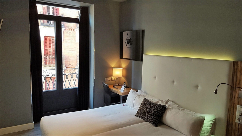 Imagen de la habitación del Hotel Petit Palace Tres Cruces. Foto 8