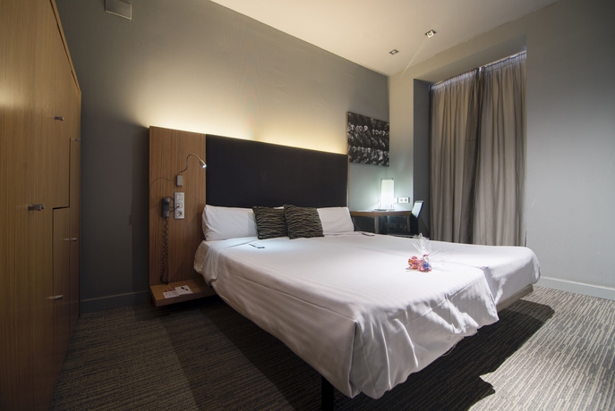 Imagen de la habitación del Hotel Petit Palace Tres Cruces. Foto 11