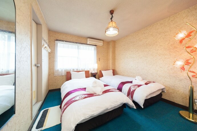 Imagen de la habitación del Hotel Petit P-bow. Foto 23