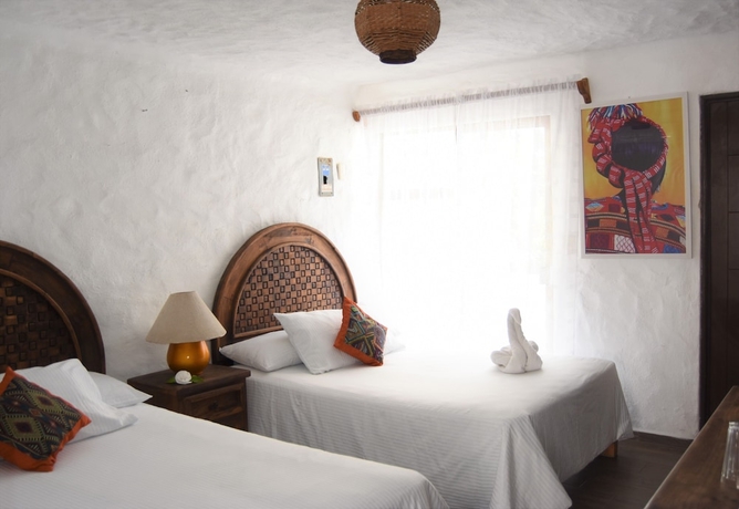 Imagen de la habitación del Hotel Petit Pilitas. Foto 13