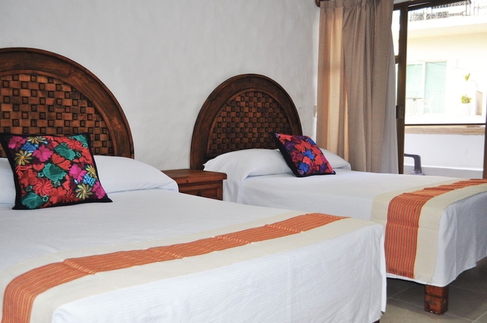 Imagen de la habitación del Hotel Petit Pilitas. Foto 16