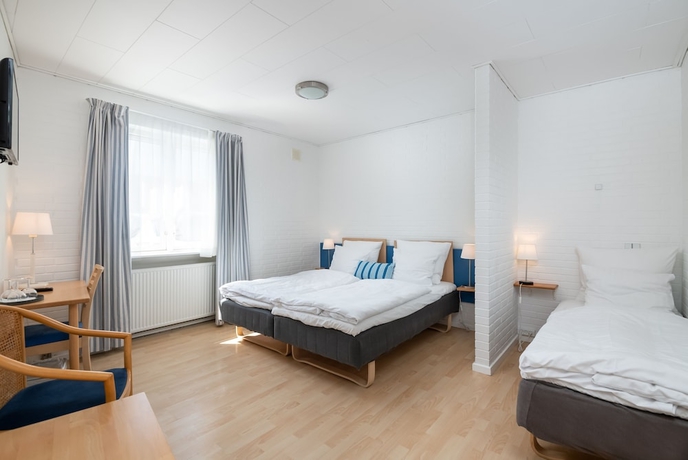Imagen de la habitación del Hotel Petit Skagen. Foto 11