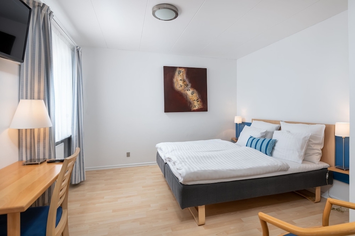 Imagen de la habitación del Hotel Petit Skagen. Foto 17