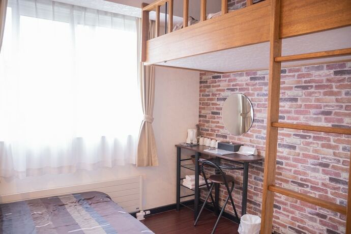 Imagen de la habitación del Hotel Petit-hotel #melon Furano. Foto 8