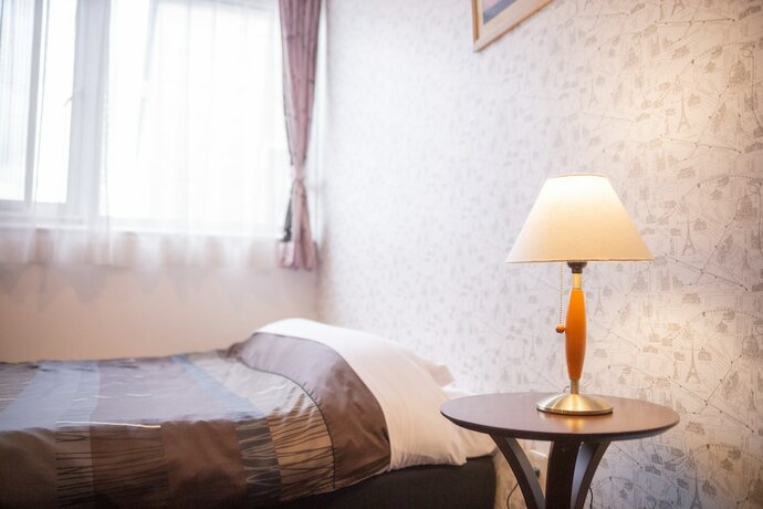 Imagen de la habitación del Hotel Petit-hotel #melon Furano. Foto 9