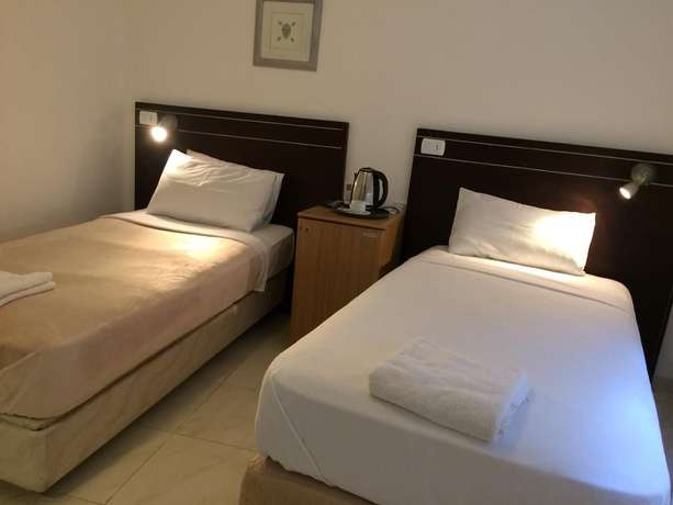 Imagen de la habitación del Hotel Petra town check-Inn. Foto 8