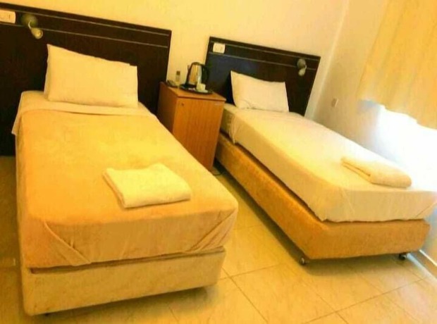Imagen de la habitación del Hotel Petra town check-Inn. Foto 11
