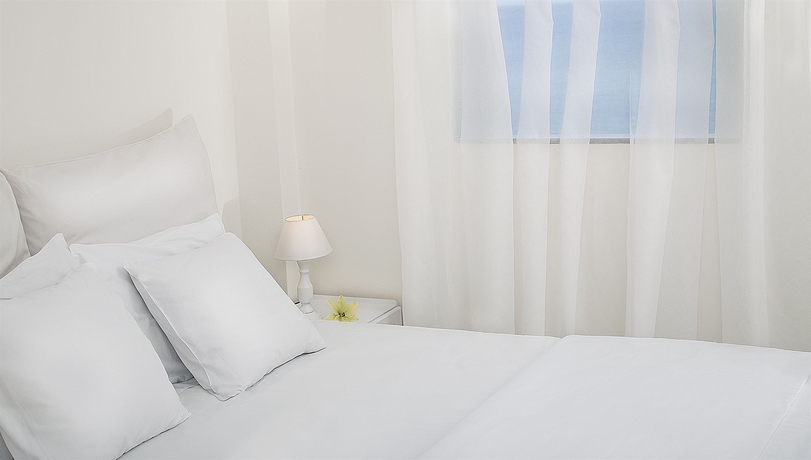 Imagen de la habitación del Hotel Petradi Beach Lounge. Foto 8