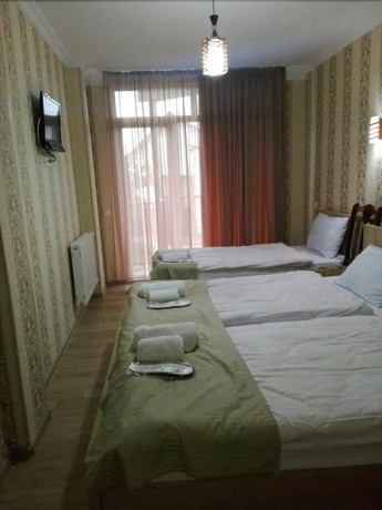 Imagen de la habitación del Hotel Petre Palace. Foto 17