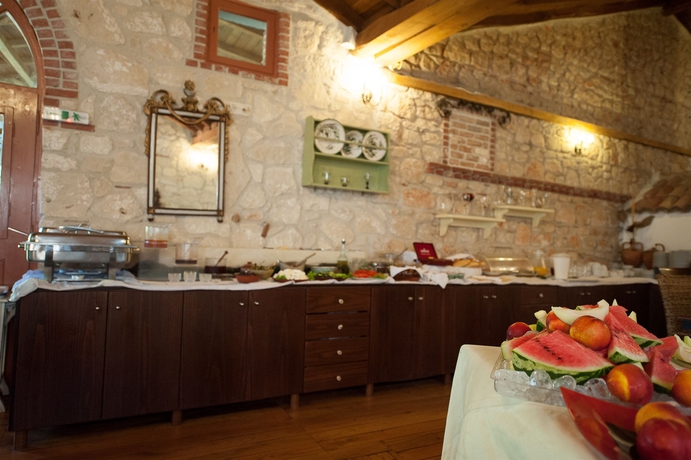 Imagen del bar/restaurante del Hotel Petrino Suites. Foto 2