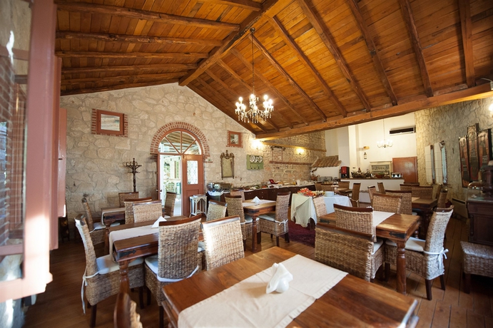 Imagen del bar/restaurante del Hotel Petrino Suites. Foto 3