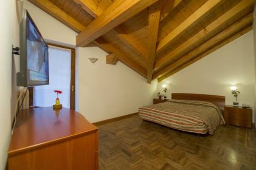 Imagen de la habitación del Hotel Pezzotti. Foto 9