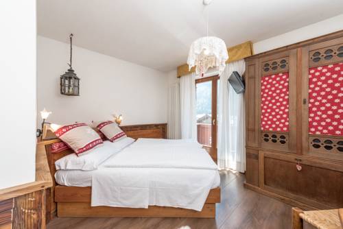 Imagen de la habitación del Hotel Pezzotti. Foto 11