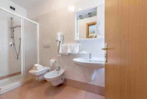 Imagen de la habitación del Hotel Pezzotti. Foto 13