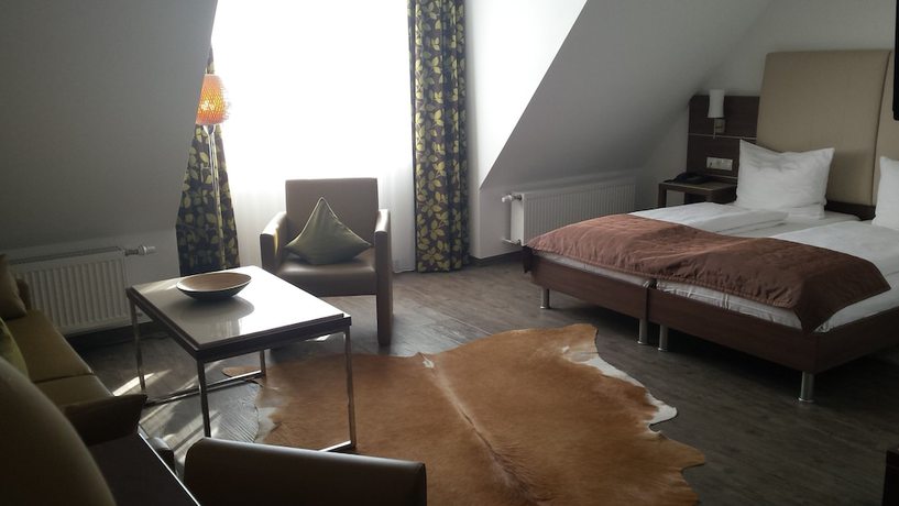 Imagen de la habitación del Hotel Pf&auml;lzer Hof, Edenkoben. Foto 11