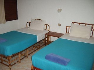 Imagen de la habitación del Hotel Pgs Hotel Sandy Bay Resort. Foto 4
