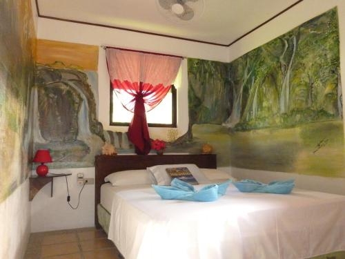 Imagen de la habitación del Hotel Phaidon Beach Resort. Foto 6